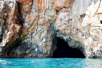 Entrance hole into the famous Blue Cave in Montenegro. Landmarks and travel destinations in Europe