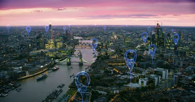 Aerial smart city. Localization icons in a connected futuristic city. Technology concept, data communication, artificial intelligence, internet of things. London skyline. Shot in 8K.
