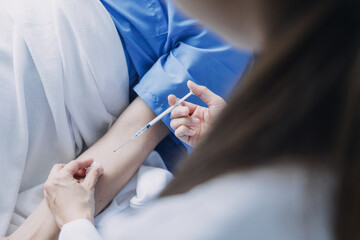 Male patient having consultation with doctor or psychiatrist who working on diagnostic examination...