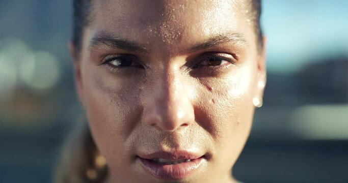 Face, portrait or serious woman in city with fitness, determined mindset or ready for a workout. Runner closeup, exercise training or female sports athlete with motivation for cardio running