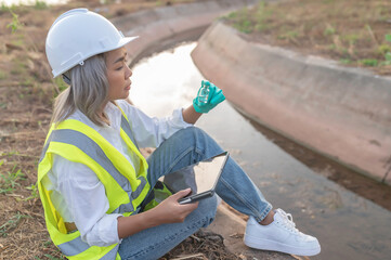 Environmental engineers inspect water quality,Bring water to the lab for testing,Check the mineral content in water and soil,Check for contaminants in water sources.