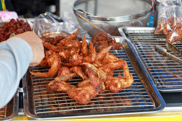 The street food scene in Thailand is renowned for its mouthwatering fried chicken.
