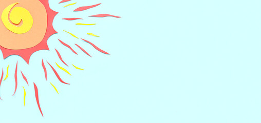 Sun made of paper on light blue background with space for text