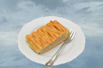 Piece  of Apple pie on white Plate, floating in the air