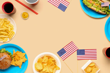 Fototapeta na wymiar Frame made of tasty dishes, drinks and American flags on color background. Memorial Day celebration