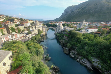 Fototapeta na wymiar View of the historic Old Bridge at sunset in Mostar. Bosnia and Herzegovina