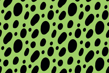 Abstract seamless pattern of black spots on green background, oval-shaped and different in sizes