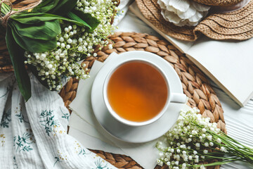 Cup of hot tea and spring home interior. good morning concept