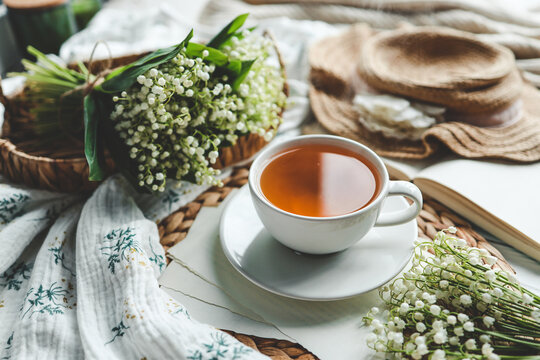 Cup of hot tea and spring home interior. good morning concept
