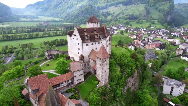 beautiful medieval castles of Europe - impressive Gutenberg in Liechtenstein, border with Switzerland, surrounded by Alps mountains, aerial view
