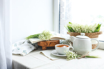 Cup of hot tea and spring home interior. good morning concept