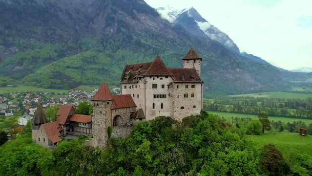 beautiful medieval castles of Europe - impressive Gutenberg in Liechtenstein, border with Switzerland, surrounded by Alps mountains, aerial view

