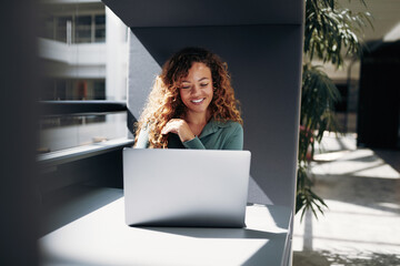 Businesswoman smiling while at work