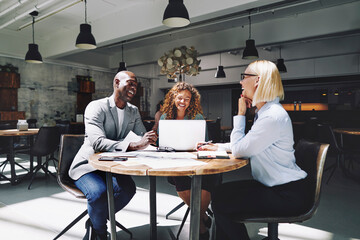 Smiling diverse businesspeople meeting together