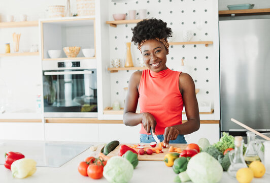 black woman african american  kitchen food girl cooking preparing breakfast  luch dinner happy