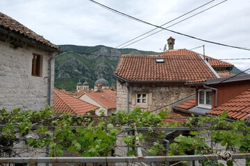 Fototapeta na wymiar Ancient buildings in Kotor, Montenegro. Kotor is a beautiful historic city on the Unesco list. 