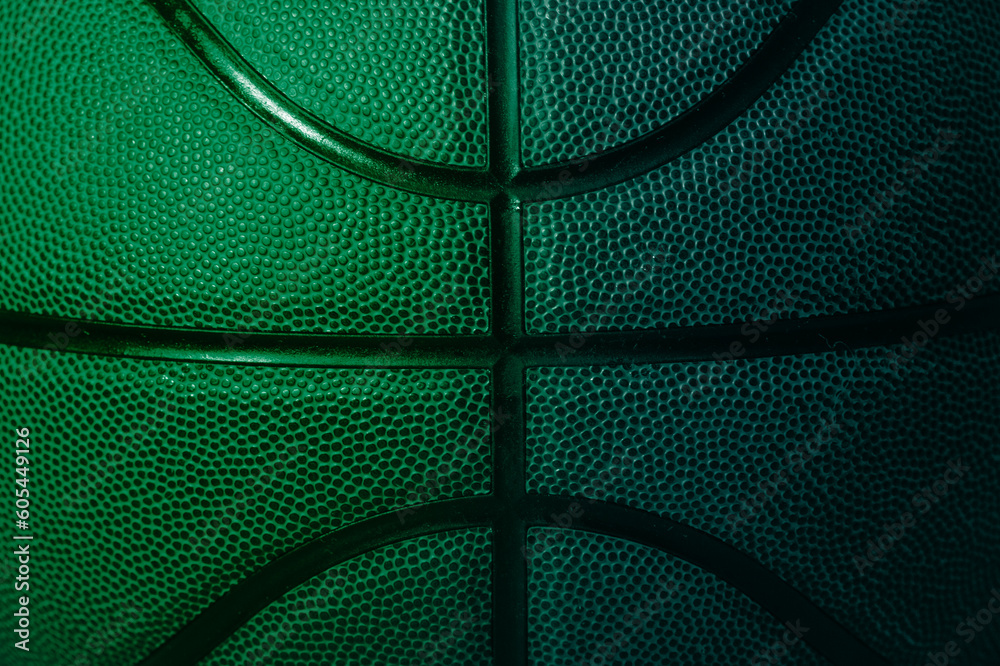 Wall mural Closeup detail of blue and green basketball ball texture background. Horizontal sport theme poster, greeting cards, headers, website and app