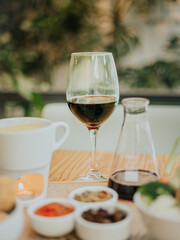 glass of wine and vegan fondue