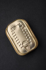 Tin or aluminum rectangular can of canned food with a key