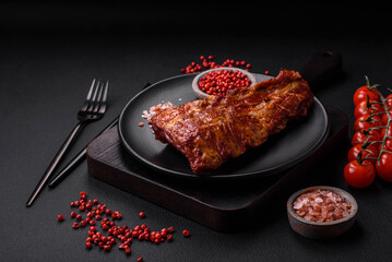 Delicious grilled or smoked pork ribs with salt, spices and herbs