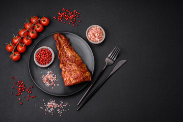 Delicious grilled or smoked pork ribs with salt, spices and herbs