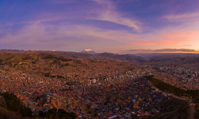 La Paz Cityscape and Illimani Mountain at Night. - obrazy, fototapety, plakaty