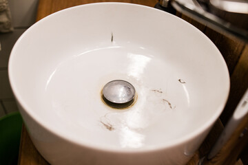 Water tap with dirty sink close up. chrome faucet wash basin. Hygiene and Cleaning hands and messy...