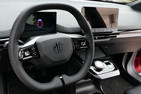 Driving wheel and modern console and front panel of compact electric family car MG4 EV, producet by  chinese company SAIC under british MG margue. 