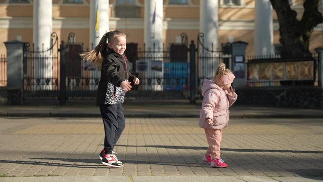 Cheerful children are walking in the fresh air