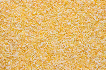 Raw corn grits top view texture