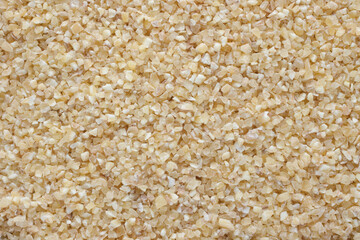 Wheat groats artek top view background