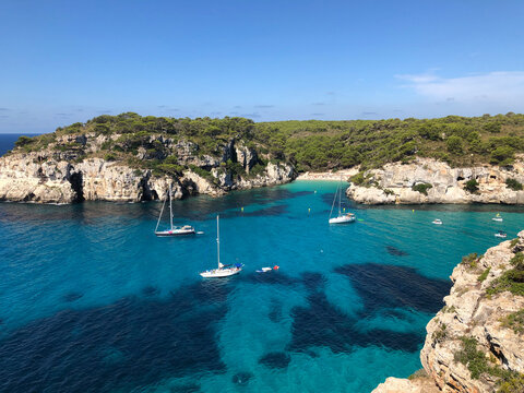 View from the Macarelleta viewpoint. Cala Macarella and Macarelleta, beautiful coves in the turquoise transparent water of the Mediterranean sea. Beaches of Menorca, Minorca, Balearic Islands, Spain