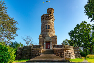 Slottsskogen water tower on a clear summer day.