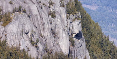 Fototapeta na wymiar Rocky cliffs on Chief Mountain in Squamish, BC, Canada. Nature Background. Sunny day.