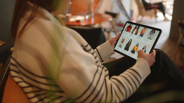 Tablet Shopping at its Best: Woman Finds Deals on Clothes Instantly