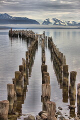 Burned pier at sunrise in Puerto Natales, Chile