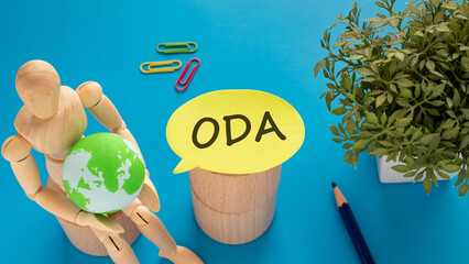There is Speech Bubble with the word ODA. It is an abbreviation for Official Development Assistance...