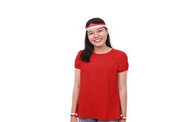 Fototapeta na wymiar Young Indonesian girl celebrate indonesia independence day with red white head band