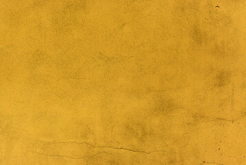 yellow painted house wall with texture as background 2