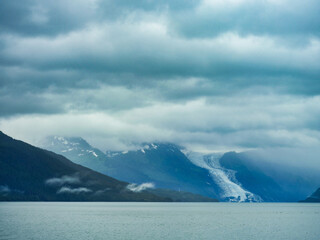 Glaciers Mountains with fog and mist in Prince William sound near Whittier Alaska