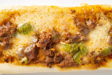 top view fresh cooked beef pizza with cheese close up
