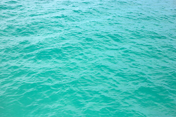 Blue green sea water surface texture. Blue ocean summer