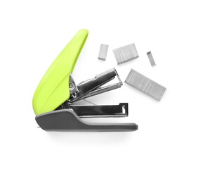 Bright green stapler with staples isolated on white, top view