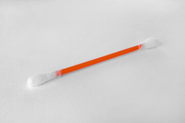 Clean cotton bud isolated on white. Hygienic accessory