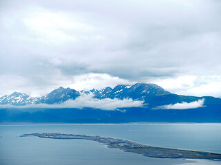 The Homer Spit and Kachemak Bay and mountains seen from a hilltop in Alaska