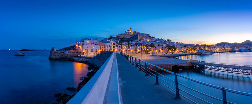 View of Cathedral and Dalt Vila from harbour at dusk, UNESCO World Heritage Site, Ibiza Town, Eivissa, Balearic Islands, Spain, Mediterranean, Europe