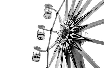 Photograph of the Ferris wheel ride, located in Sunset Park La Libertad, El Salvador. built by president nayib bukele. black and white