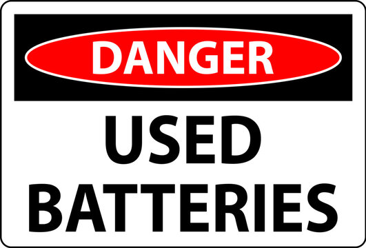 Danger Sign Used Batteries On White Background