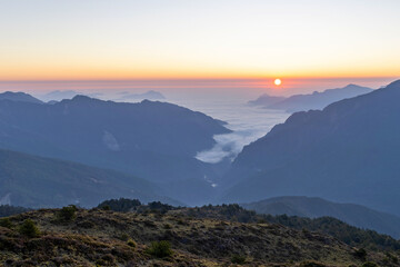 Fototapeta na wymiar Beautiful sunrise of Hehuanshan North Peak Trail at Hehuanshan National Forest Recreation Area in Nantou Taiwan,