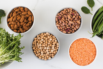 Legumes in glass jars top view. Vegetable protein, vegetarianism, healthy eating